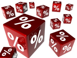 several 3d dice with percent symbols on with barkground